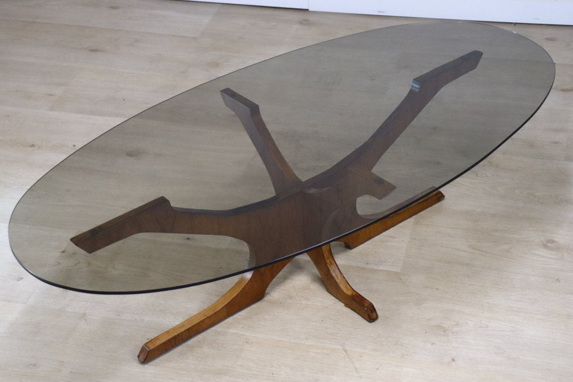 Table basse vintage Hugues Poignant en teck et verre fumé, 1960